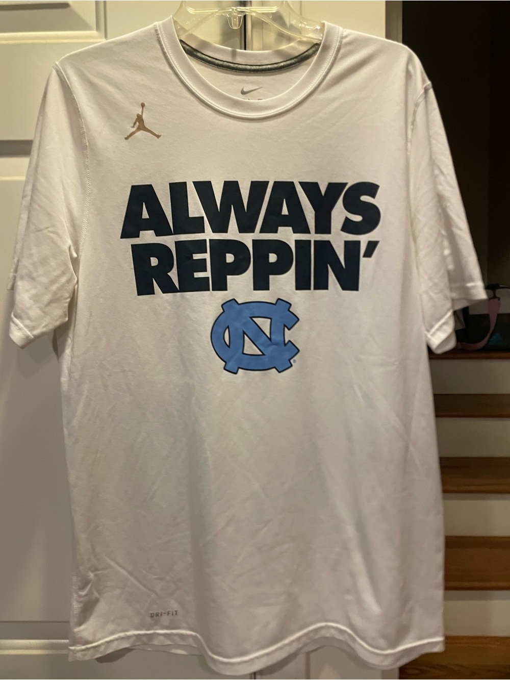 Nike White Short-Sleeve 'Always Reppin' Tee with Light Blue UNC Logo